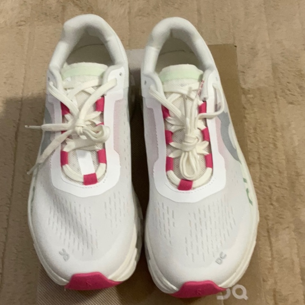 On Running Cloud Monster Sneakers in White, Pink and Green.